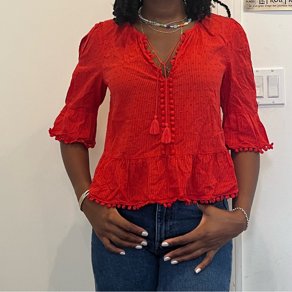 Red eyelet blouse
